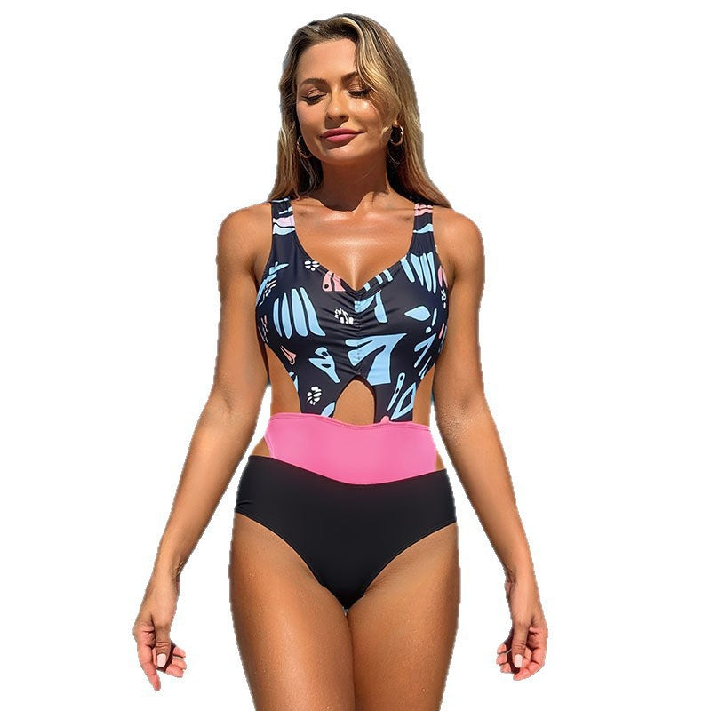 Damen Einteiler Badeanzug mit modernem Cut-Out Design und farbenfrohen Akzenten Echo Archiv