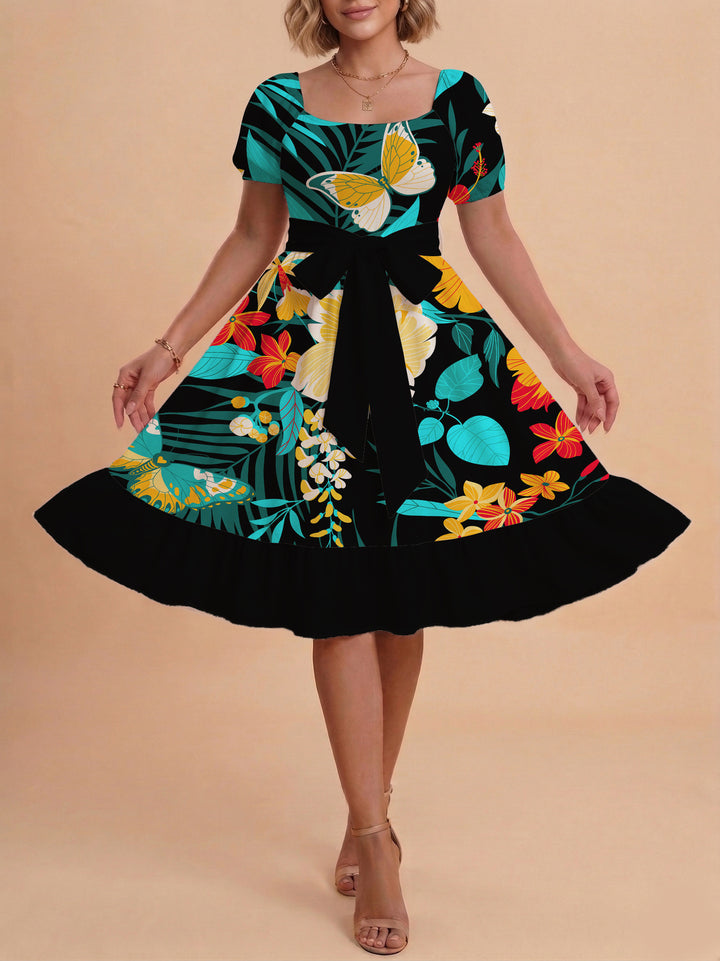 Damen modernes Blumenkleid mit elegantem Taillengürtel und asymmetrischem Saum Echo Archiv
