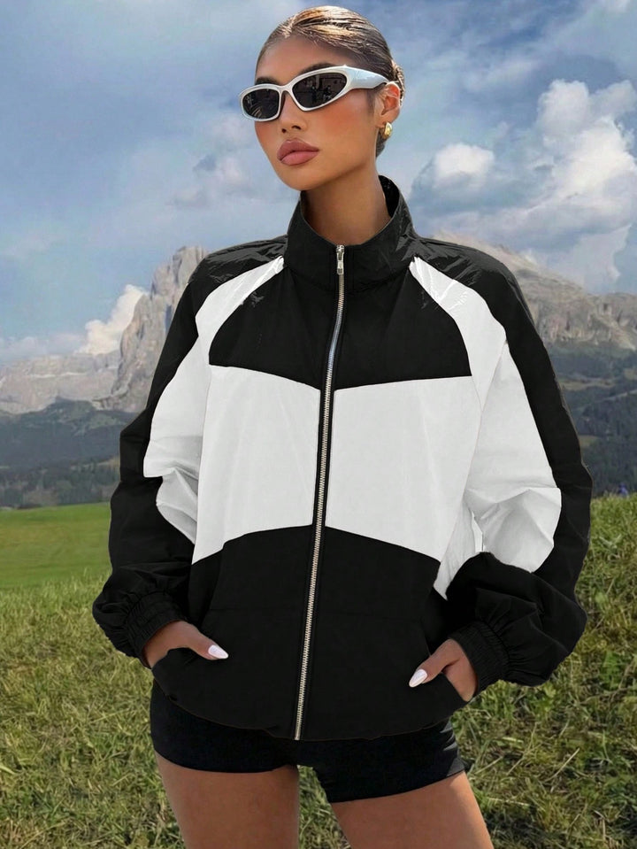 Damen Leichte Windbreaker-Jacke mit Stehkragen, Farbblock-Design und elastischen Bündchen Echo Archiv
