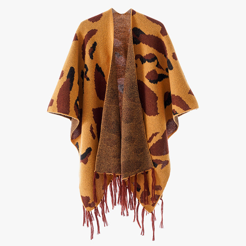 Damen Oversize-Strickponcho mit animalischem Jacquard und Fransensaum Echo Archiv
