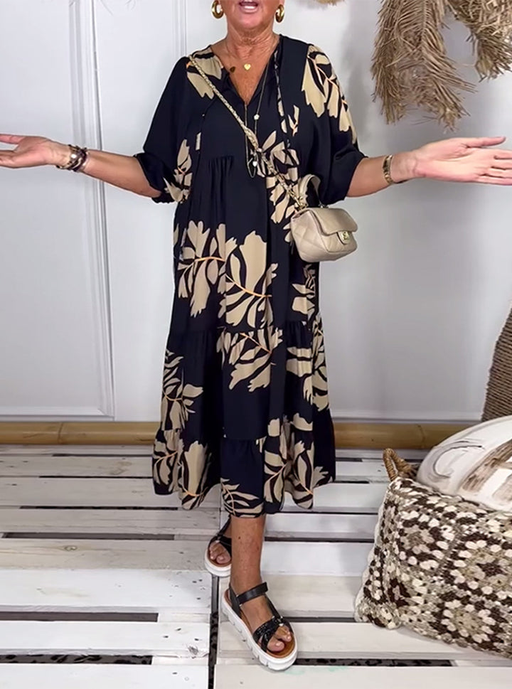 Damen nan lockeres Stufenmidikleid mit V-Ausschnitt und großflächigem Blumenprint Echo Archiv