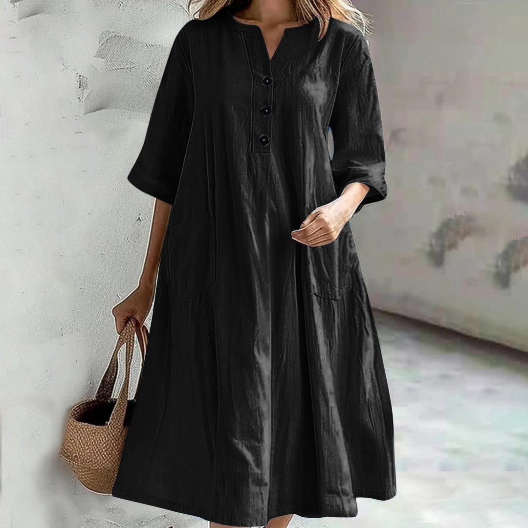 Damen nan locker fallendes A-Linien Kleid mit V-Ausschnitt-Knopfleiste, 3/4-Ärmeln und aufgesetzten Eingrifftaschen Echo Archiv