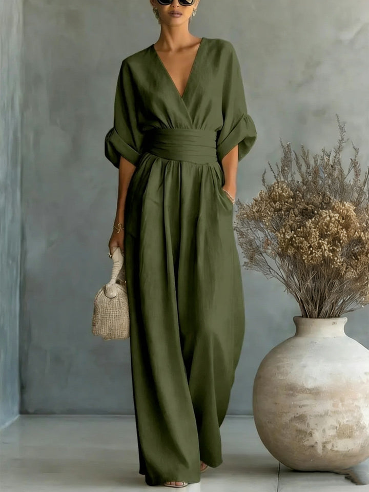 Echoarchiv | Eleganter Ärmelloser Jumpsuit mit Tiefem V-Ausschnitt, Taillenbund und Weitem Bein