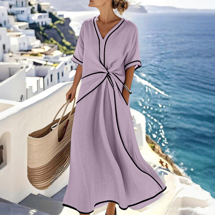 Damen Langes A-Linienkleid mit V‑Ausschnitt, Knoten-Detail und Kontrastpaspel – Élara