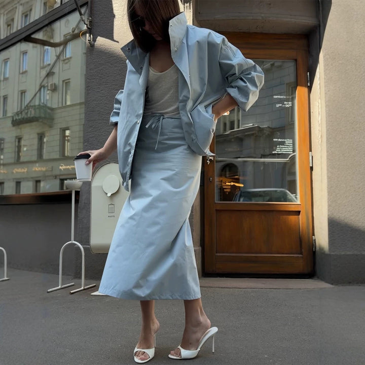 Damen Zweiteiliges Co-Ord-Set aus leichter Windjacke mit Tunnelzug und tailliertem Maxi-Rock Echoarchiv