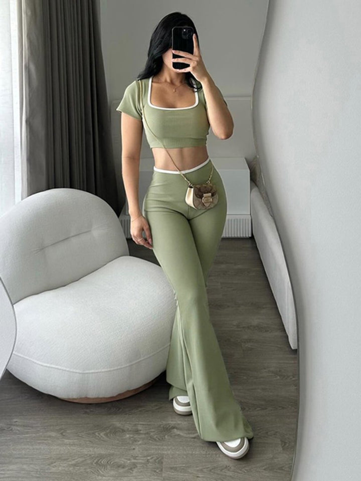 Damen modisches Crop-Top mit tailliertem Schnitt und weiter Hose Echo Archiv