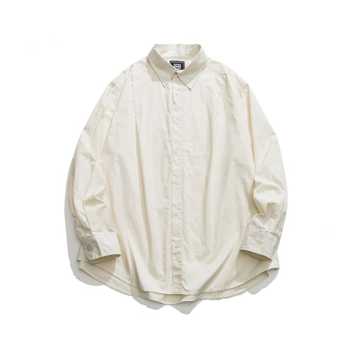 Unisex Oversized Hemdjacke mit seitlichen Zierknopfreihen und gerundetem Saum Echoarchiv