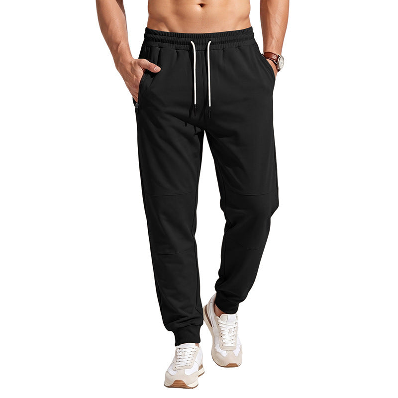 Herren Slim-Fit Jogginghose mit Kordelzug, Reißverschlusstaschen und Rippbündchen Echoarchiv
