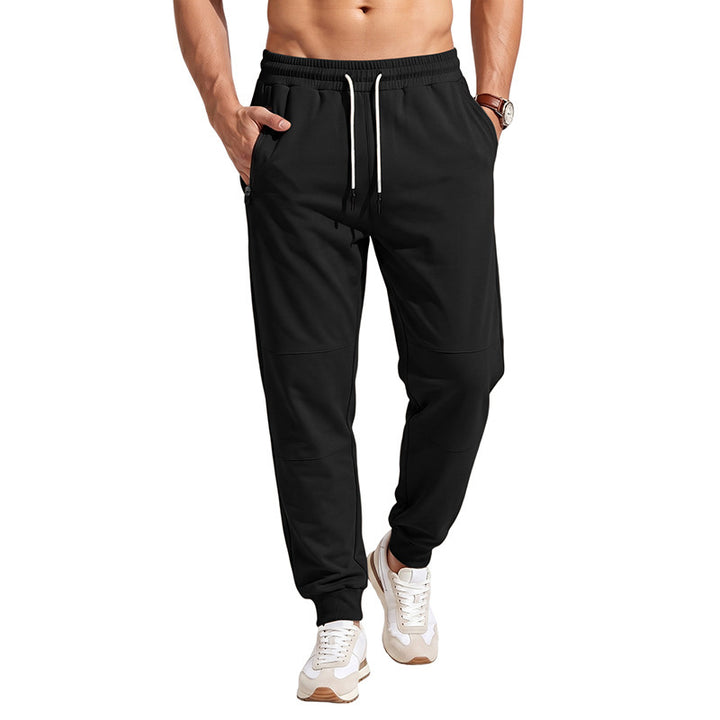 Herren Slim-Fit Jogginghose mit Kordelzug, Reißverschlusstaschen und Rippbündchen Echoarchiv