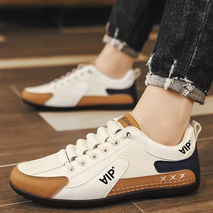 Herren Casual-Sneaker im Retro-Look mit geprägtem Obermaterial und kontrastierenden Overlays Echoarhiv