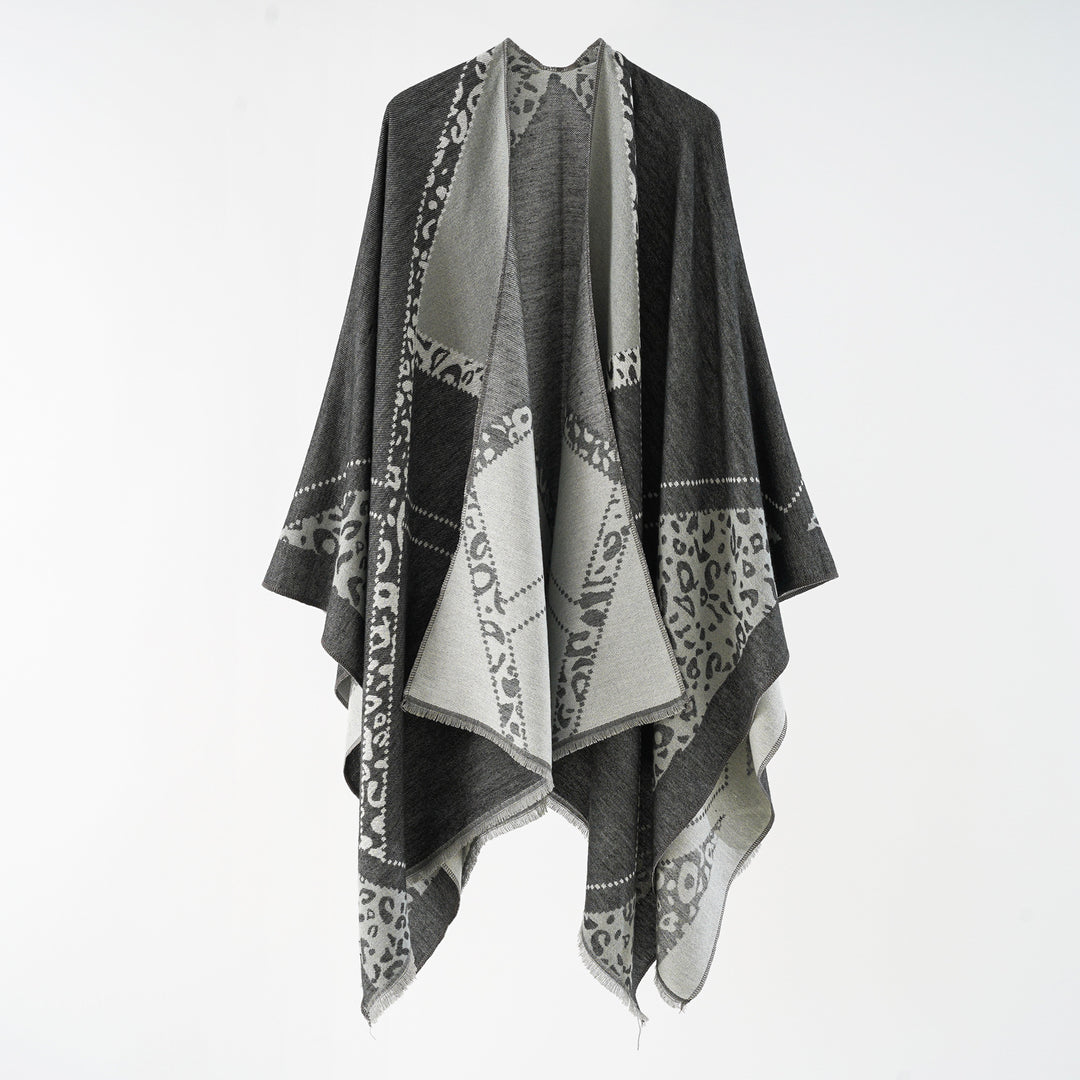 Damen Oversize Cape-Überwurf mit jacquardgewebten Patchmotiven und Fransensaum Echo Archiv