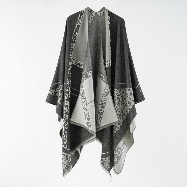 Damen Oversize Cape-Überwurf mit jacquardgewebten Patchmotiven und Fransensaum Echo Archiv