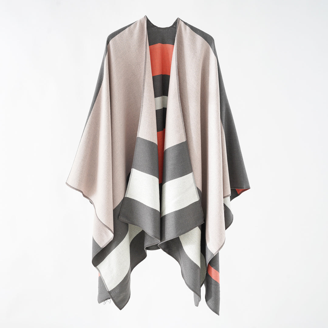 Damen Oversize-Ruana im Cape‑Stil aus Wolloptik mit geometrischen Blockstreifen Echo Archiv