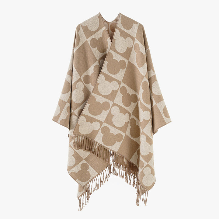 Damen Oversize-Jacquardponcho mit grafischem Kopf-Silhouettenmuster und Fransen – Avérine