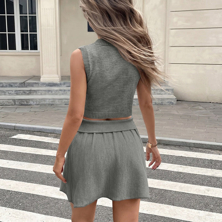 Damen Gestricktes Cropped-Set mit V-Ausschnitt, Ärmellosem Pullover und plissiertem Minirock Echoarchiv