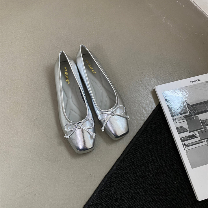 Damen klassisch geschnittene Ballerinas mit zierlichem Schleifenakzent und komfortabler Fußbettung Echoarchiv