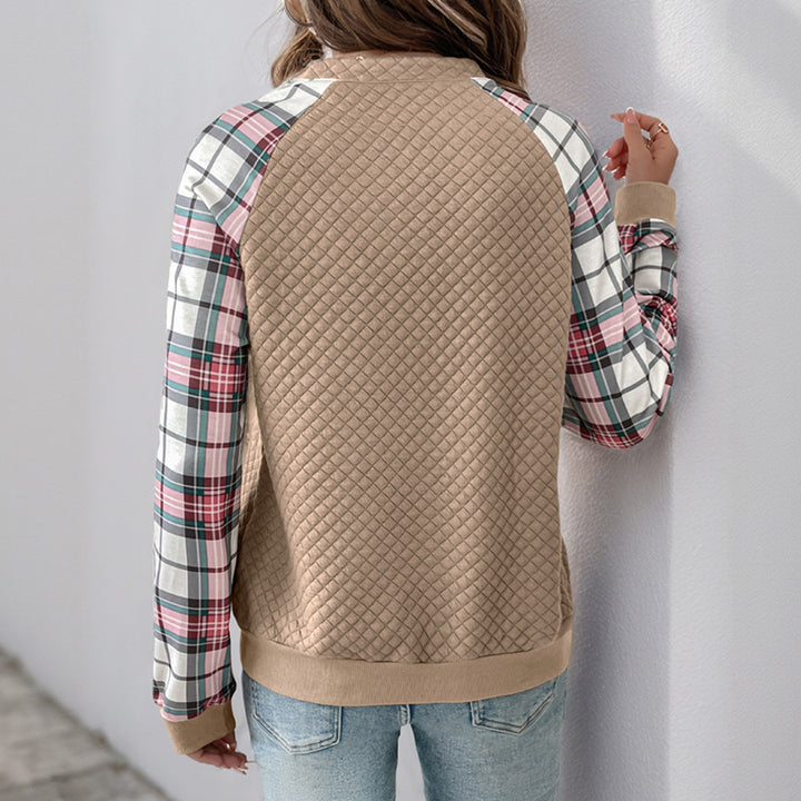 Damen Gesteppter Raglan-Sweatpullover mit halbem Reißverschluss und Karoärmeln Echoarchiv