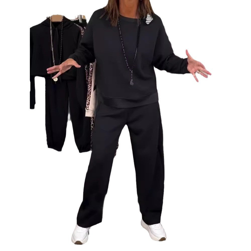 Damen nan Oversize-Jogging-Set mit kastigem Sweatshirt und weiter Palazzo-Hose mit dekorativem Seitenband Echo Archiv