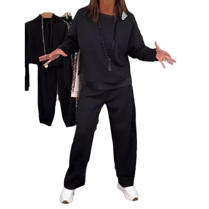 Damen nan Oversize-Jogging-Set mit kastigem Sweatshirt und weiter Palazzo-Hose mit dekorativem Seitenband Echo Archiv
