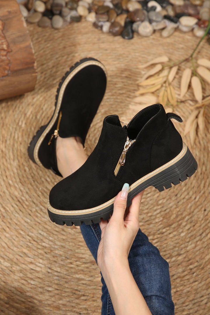 Damen Kurzschaft‑Stiefelette mit grober Profilsohle und seitlichem Reißverschluss Echo Archiv