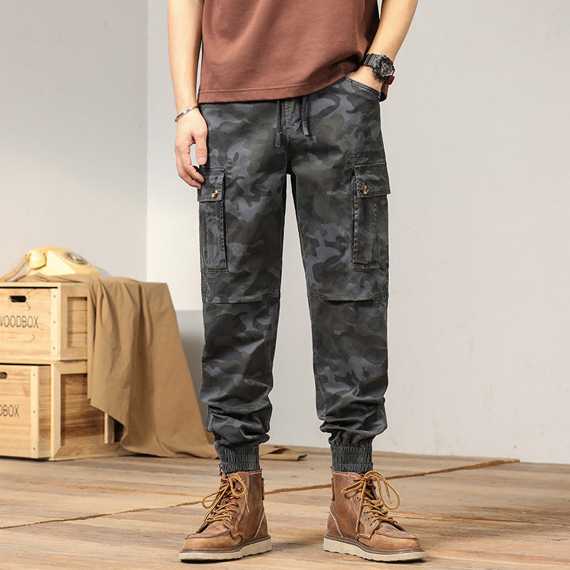 Herren taktische Cargojoggerhose im Camouflage‑Look mit Tunnelzugbund, verstärkten Knien und Bündchenabschlüssen Echo Archiv