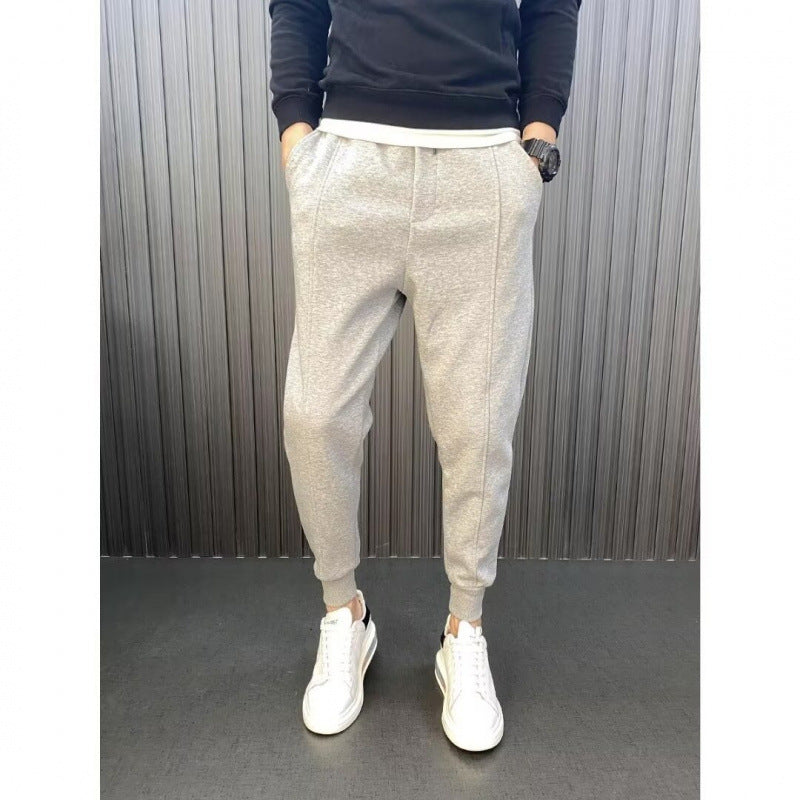 Herren Jogginghose mit tailliertem Tapered‑Schnitt, Bügelfalte und elastischen Bündchen Echoarchiv
