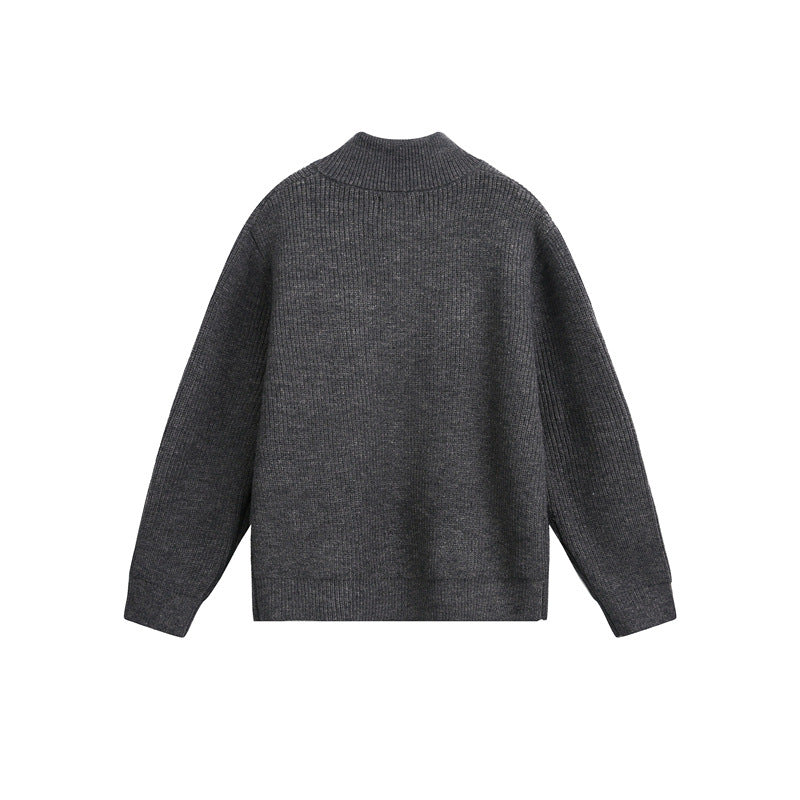 Unisex Grobstrick-Pullover mit halbem Reißverschluss und Stehkragen Echoarchiv