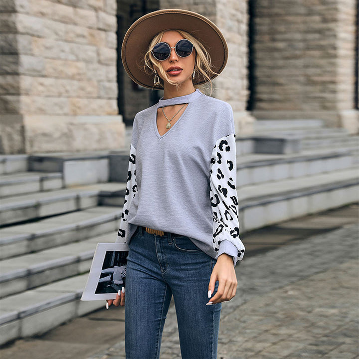 Damen Lässiger Pullover mit Leopardenärmel Echo Archiv