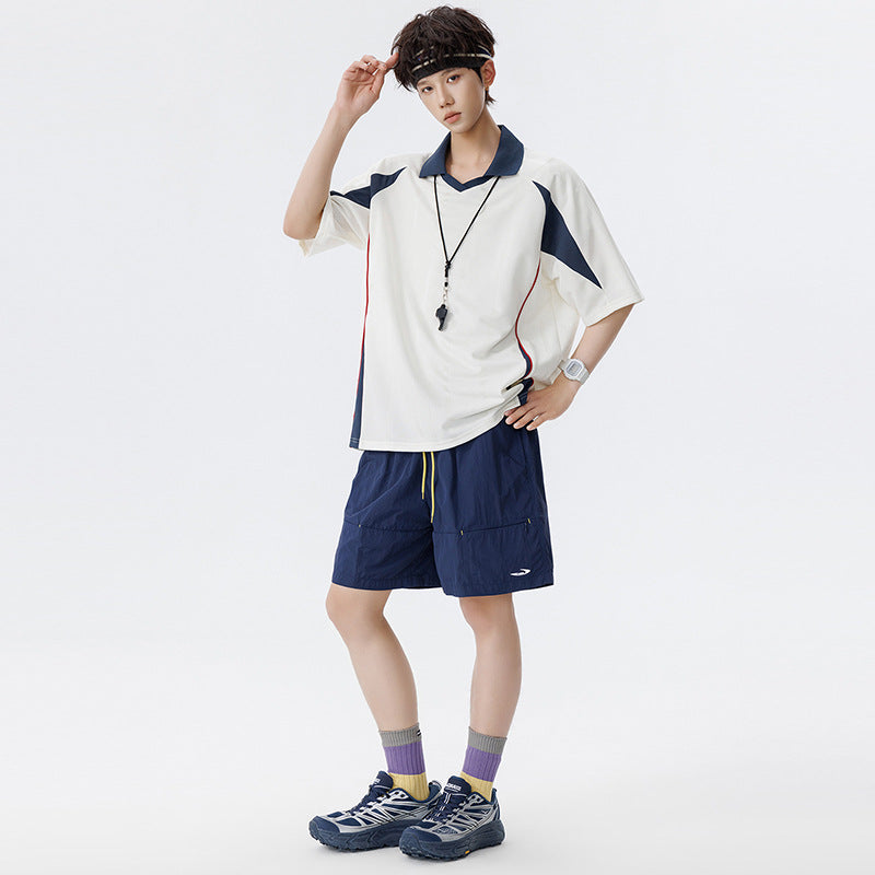 Herren Sportives Oversize-Poloshirt mit V-Ausschnitt, Kontrastpaspeln und atmungsaktivem Material Echo Archiv