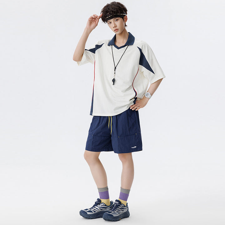 Herren Sportives Oversize-Poloshirt mit V-Ausschnitt, Kontrastpaspeln und atmungsaktivem Material Echo Archiv