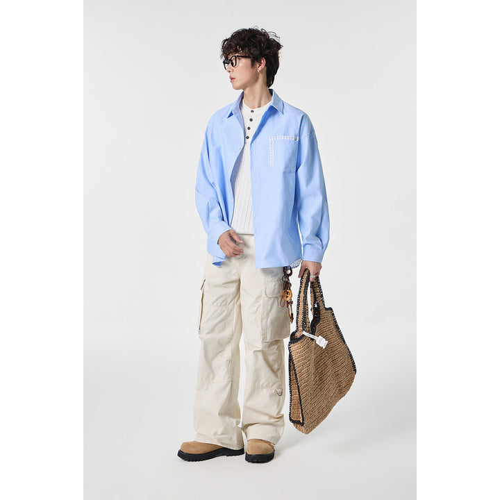 Damen Oversize Baumwoll-Hemd mit Karobesatz an Brusttasche und Saum Echoarchiv