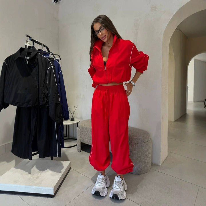 Damen Kurzgeschnittenes Windbreaker-Set mit weiter Trackhose und Kontrastpaspel Echoarchiv