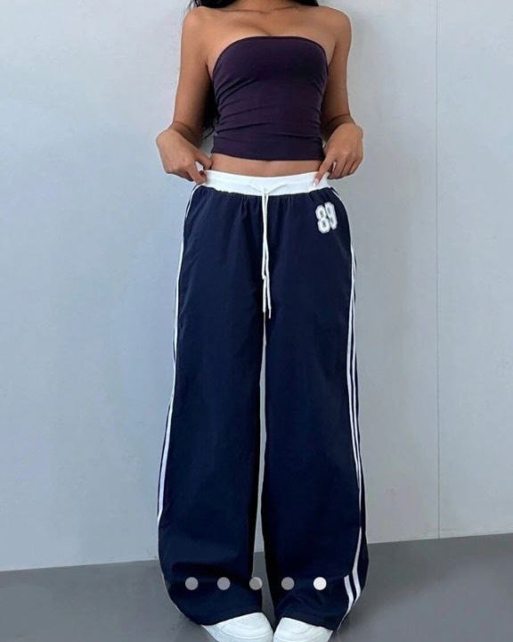 Damen Sportliche Jogginghose mit seitlichen Streifen Echo Archiv