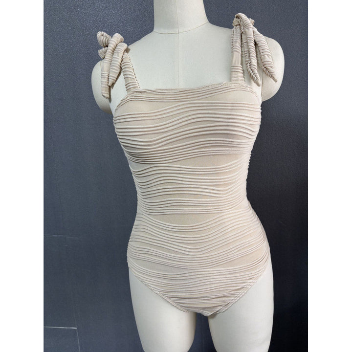 Damen Einteiler Badeanzug mit modischem Wickelrock und eleganten Bindebändern Echo Archiv