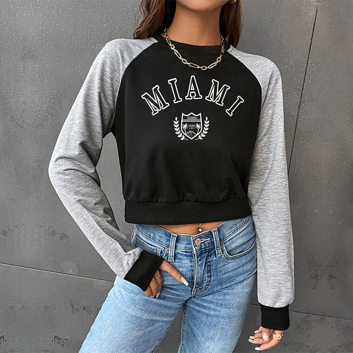 Damen Kurzgeschnittenes College-Cropped-Sweatshirt mit Raglanärmeln und elastischem Saum Echoarchiv