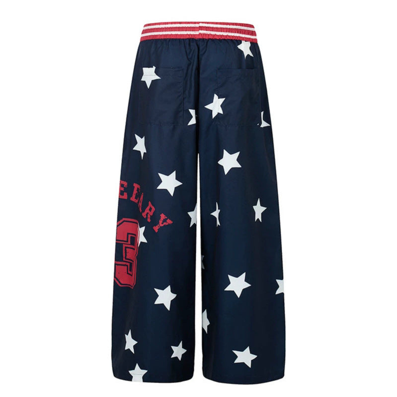 Damen Palazzo-Loungehose im Athleisure-Stil mit Stern-Allover, hohem Rippbund und Statement-Print Echoarchiv