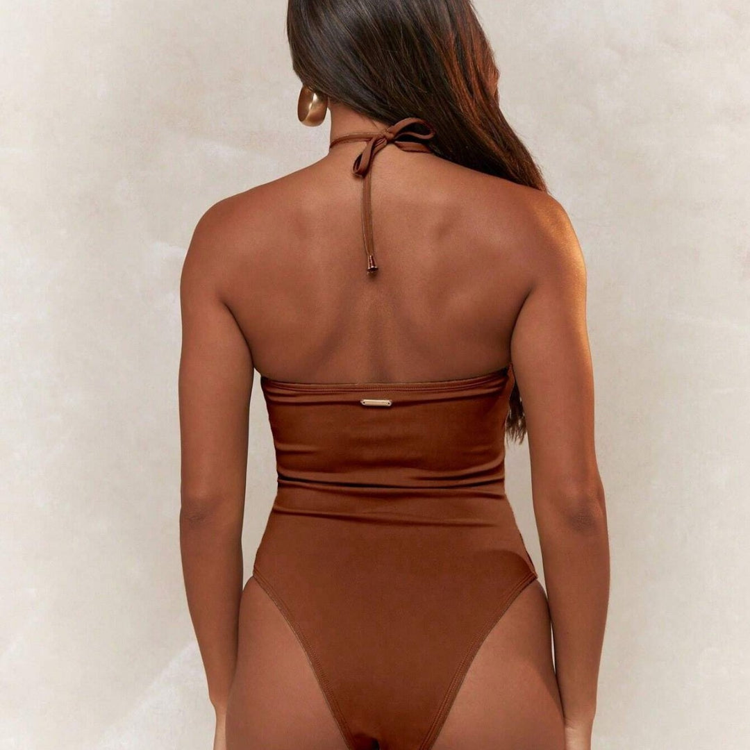Damen Trendiger Einteiler Badeanzug mit verspieltem Cut-Out Echo Archiv