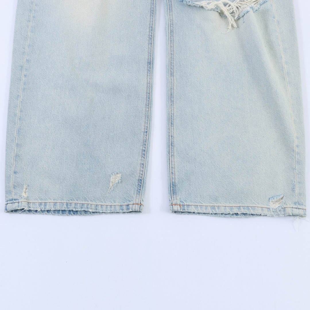 Damen weite Destroyed-Jeans mit hoher Bundführung, ausgefransten Cut‑outs und weitem Bein – Dénora