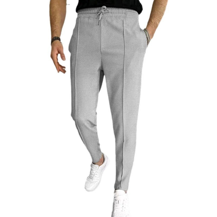 Herren Jogginghose mit seitlichen Reißverschluss-Taschen und modernem Schnitt Echoarchiv