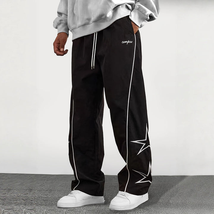 Herren Weite Trackpants mit Kontrastpaspel, Kordelzug und Sternapplikation Echo Archiv