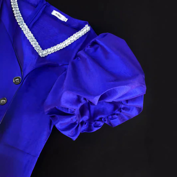 Damen Glamouröses Abendkleid mit voluminösen Puffärmeln und Fransen Saum Echo Archiv