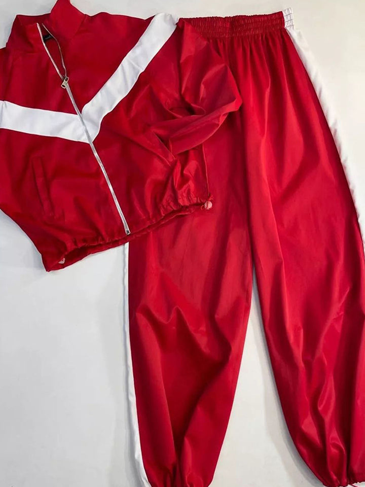Damen nan Satin-Trackset mit Stehkragen, Chevron-Streifen und Kordelzug Echo Archiv