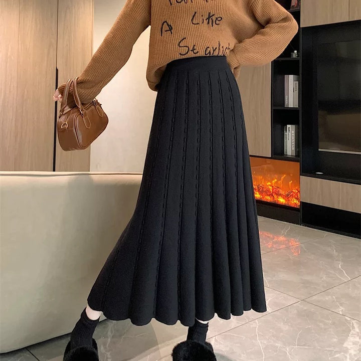 Damen Eleganter Plisseerock mit gehäkeltem Muster Echo Archiv