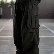Herren Oversize-Baggy-Cargohose im Urban-Utility-Stil mit elastischem Tunnelzugbund und Mehrfachklappentaschen Echo Archiv