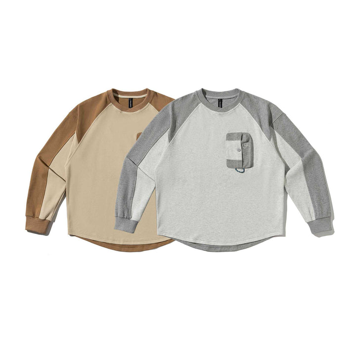 Unisex Raglan‑Sweatshirt mit halbrundem Saum und aufgesetzter Brusttasche Echoarchiv