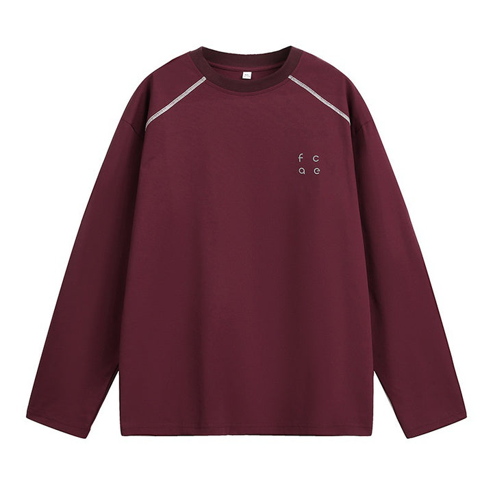 Unisex Oversize Langarmshirt aus Baumwollmix mit Raglannähten und minimalistischer Bruststickerei Echo Archiv