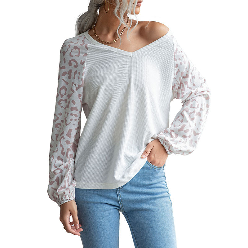 Damen Feinstrick-V‑Neck-Shirt mit Waffelstruktur und Chiffon-Leopardenärmeln Echoarchiv