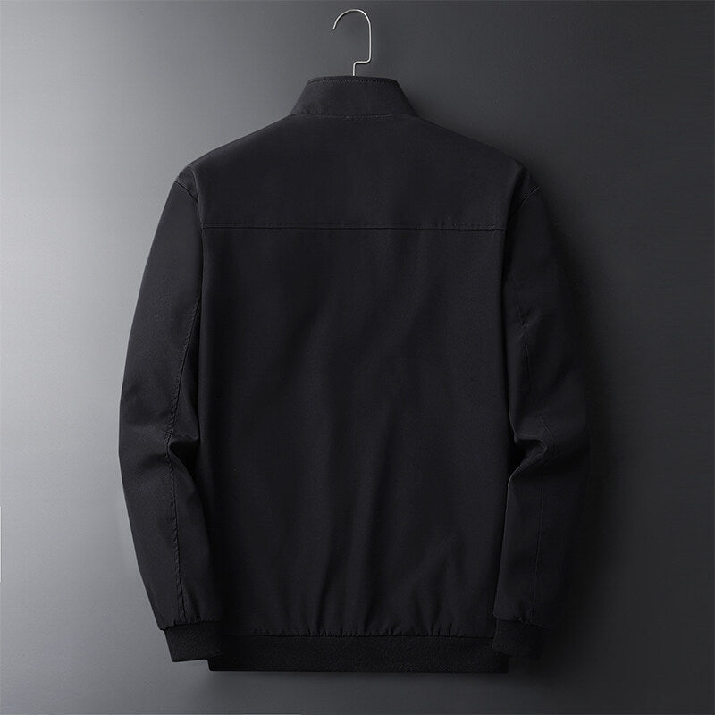 Herren Leichte Softshell-Blousonjacke mit Stehkragen, Reißverschlusstaschen und gerippten Bündchen Echoarchiv