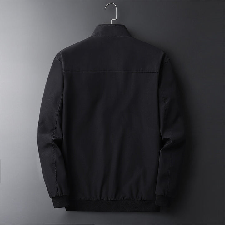 Herren Leichte Softshell-Blousonjacke mit Stehkragen, Reißverschlusstaschen und gerippten Bündchen Echoarchiv