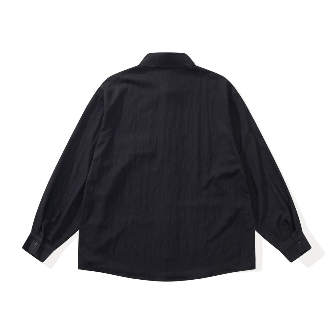 Unisex Oversized Hemdjacke im Patchwork‑Design Echoarchiv